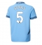 Maillot de football Réplique Manchester City John Stones #5 Domicile 2024-25 Manche Courte